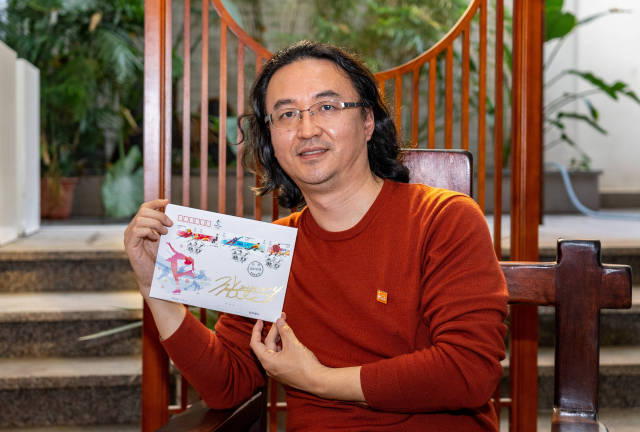 张强和他的邮票设计